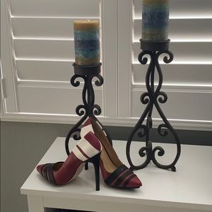 GX red heels with black and white stripes